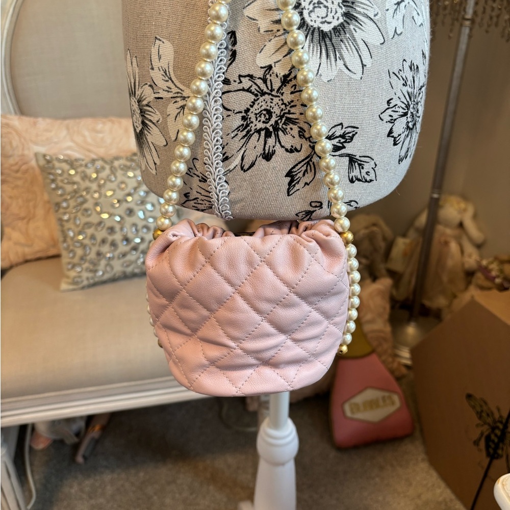 CHANEL Light Pink Quilted Mini Drawstring Bag with Pearl Chain. Never Used. - Picture 7 of 16